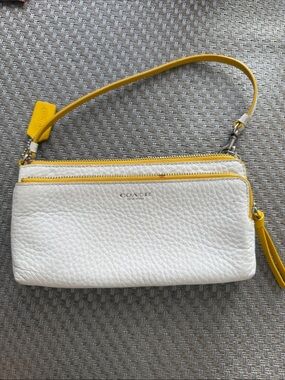 Coach White Pebbled Leather Wristlet with Yellow Trim and Strap